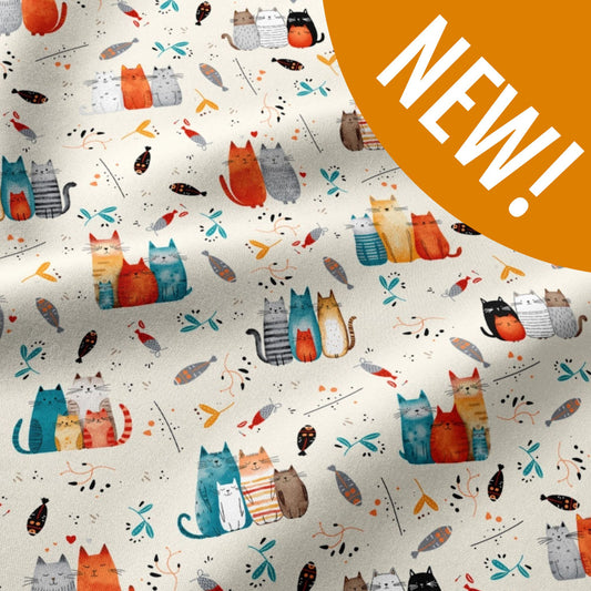 new cotton print with a family cats in different colours and shades 