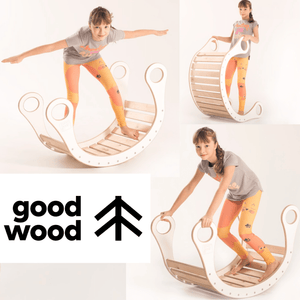 girl balancing on good wood rocker in colour white